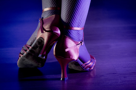 Woman dancing in heels.の写真素材