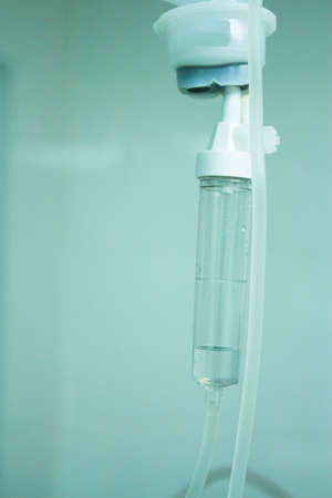 Drip on blue background, no people. Soft light.の写真素材