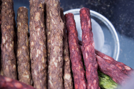 Shot of dog snacks. Red and brown colour.の写真素材