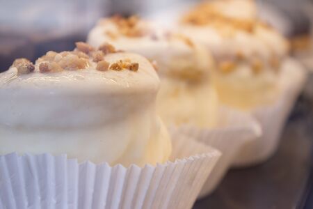 White chocolate cupcakes with almondsの写真素材