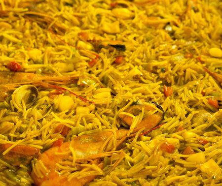 Seafood fideuÃÂ¡ finishing cookingの写真素材