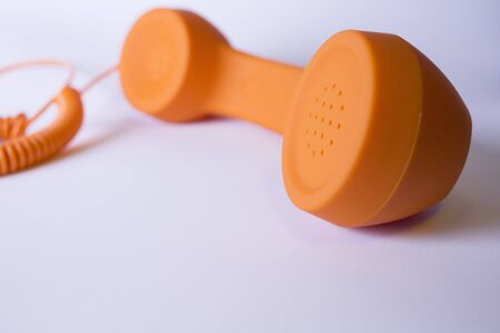 Orange analog phone. No peopleの写真素材