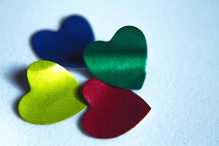 Red and gold shiny hearts isolatedの写真素材
