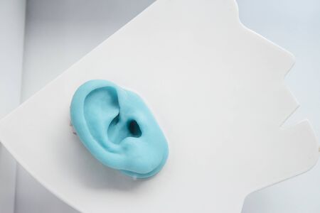 Fake plastic ear for hearing simulationの写真素材