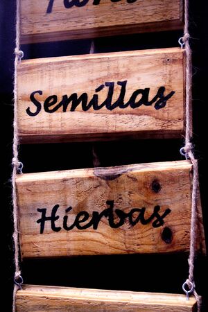 Wooden poster with infusions written in spanishの写真素材