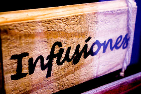 Wooden poster with infusions written in spanishの写真素材