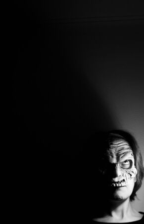 Portrait of a zombie woman at halloween partyの写真素材