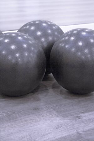 Medium size black balls for pilates exercisesの写真素材