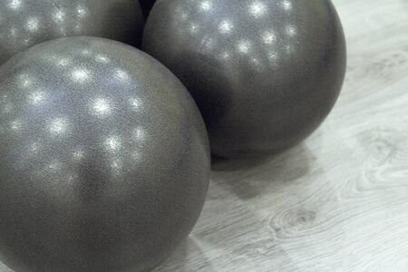 Medium size black balls for pilates exercisesの写真素材