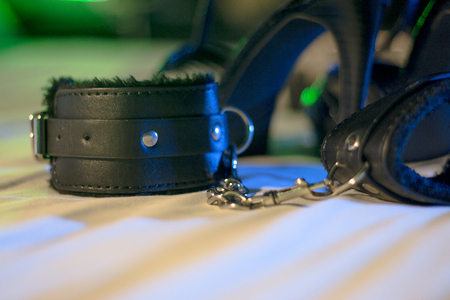 Handcuffs for erotic games. Submission. Bondage.の写真素材