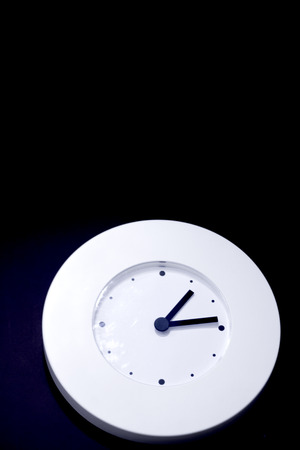 White wall clock. No people. Copy space