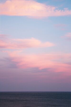 Sunset with clouds. Different shapes and colors