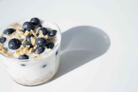 Yogurt dessert with cranberries and almonds. Raw food