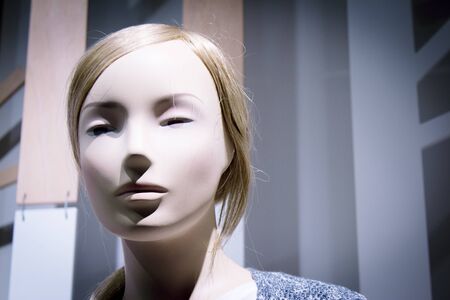 Young mannequin with short hair. Neutral expression. No peopleの写真素材
