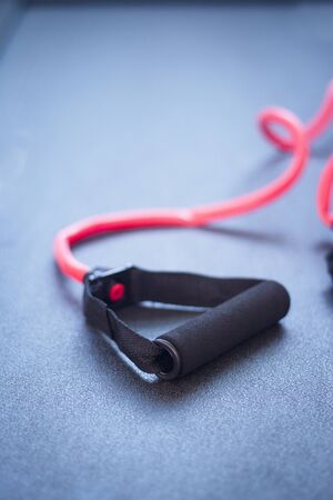 Elastic band for arm exercises on the floor. No peopleの写真素材