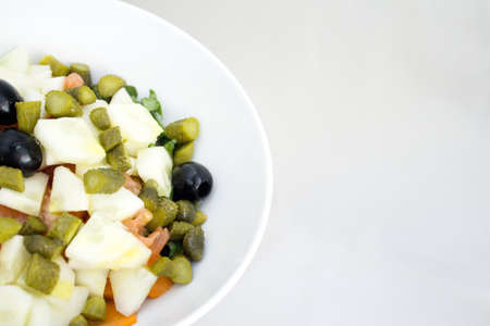 Spinach, tomato, cucumber, black olives and sweet and sour pickles salad. No peopleの写真素材