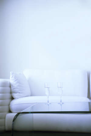 Two glasses of water on a glass table. No peopleの写真素材