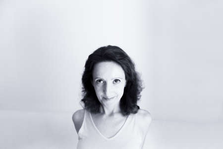 Portrait of woman with happy and positive expression. Copy space.の写真素材