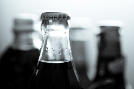 Top of a glass bottle of various soft drinks. No peopleの写真素材