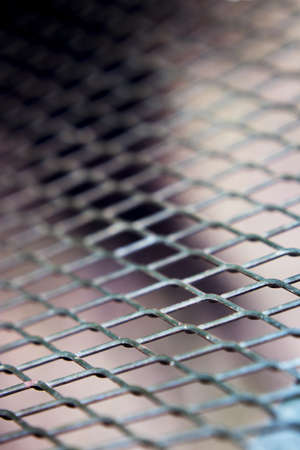 Grating with defocused rhombus shaped background. No peopleの写真素材