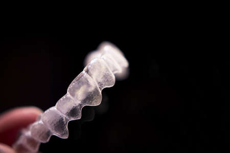 Transparent ferule retainer teeth alignment. Copy spaceの写真素材