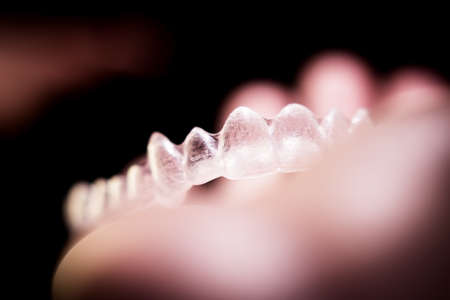 Transparent ferule retainer teeth alignment. Copy spaceの写真素材