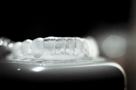 Transparent ferule retainer teeth alignment. Copy spaceの写真素材
