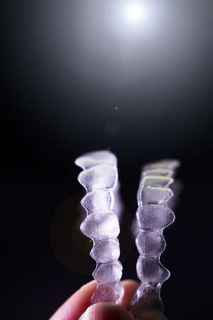 Transparent ferule retainer teeth alignment. Copy spaceの写真素材