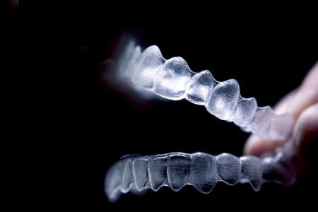 Transparent ferule retainer teeth alignment. Copy spaceの写真素材