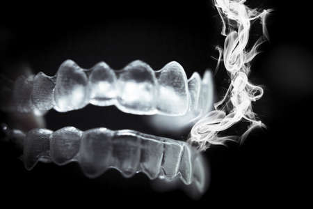 Transparent ferule retainer teeth alignment. Copy space