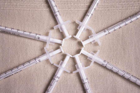 Syringes for injecting insulin in a circle. No people