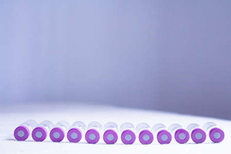 Empty glass jars of coronavirus vaccines. No people