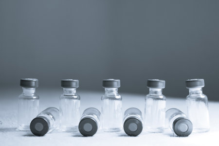 Empty glass jars of vaccines. No peopleの写真素材
