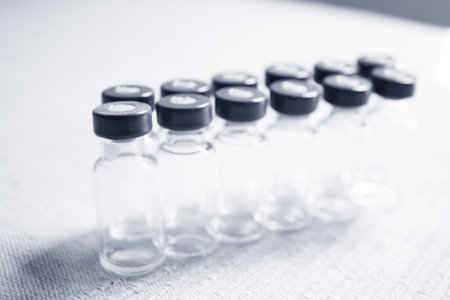 Empty glass jars of vaccines. No peopleの写真素材