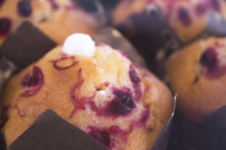 Muffins with strawberry syrup. No peopleの写真素材