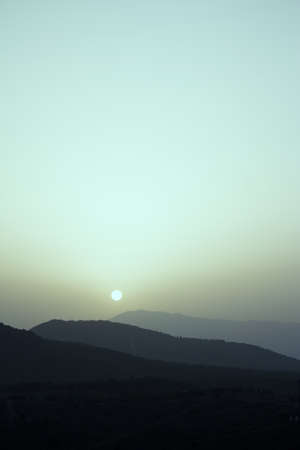 Sunset in the mountains with the sun. not peopleの写真素材