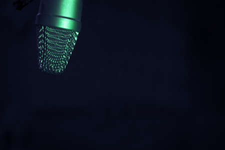 Professional microphone suspended in the air of professional studioの写真素材