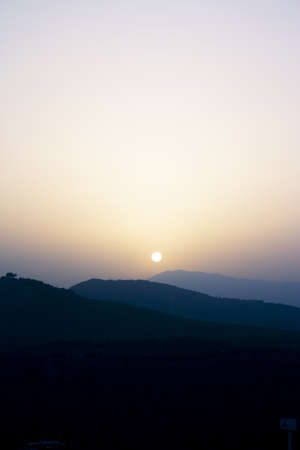 Sunset in the mountains with the sun. not peopleの写真素材