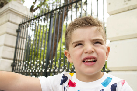 Portrait of four year old boy gesturing. one personの写真素材