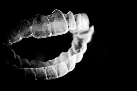 Invisible teeth aligner on light background. no people