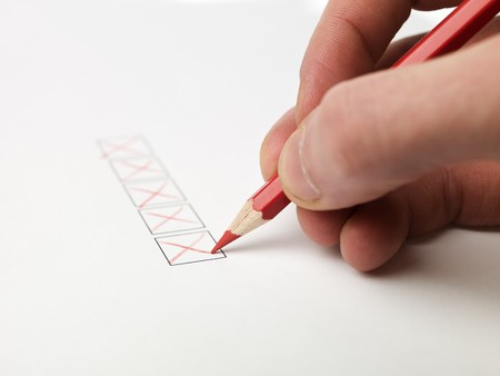 Hand filling check boxesの写真素材