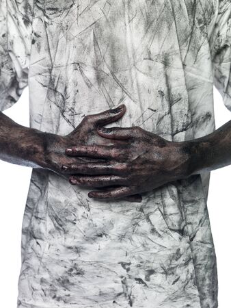 Dirty hands in front of a dirty shirtの写真素材
