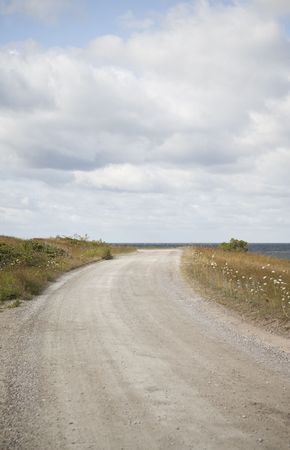 Dirt Road by the seaの写真素材