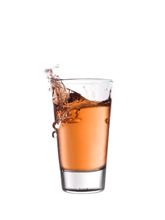 Splash in a glass of red lemonadeの写真素材
