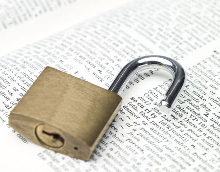 Padlock surrounding the word securityの写真素材