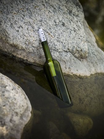 The word 'help' enclosed in a bottleの写真素材