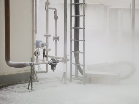 Misty industry complex shot during day timeの写真素材