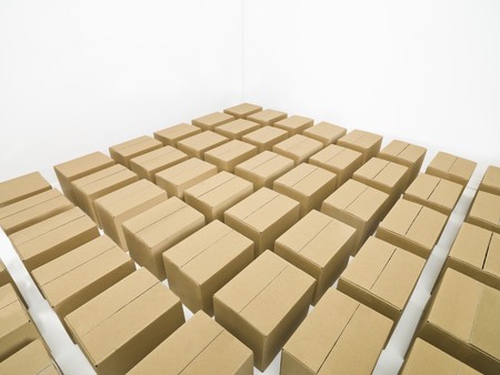 Arranged cardboard boxes on white backgroundの写真素材