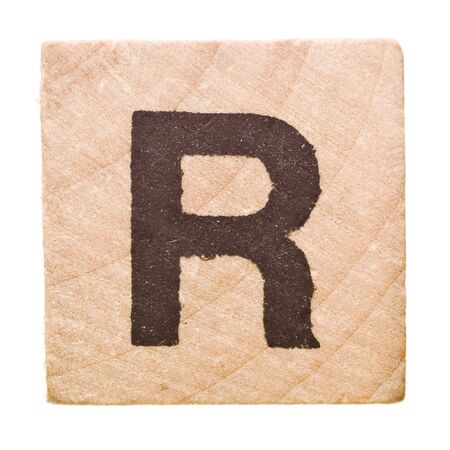 Block with Letter R isolated on white backgroundの写真素材