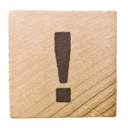 Block with exclamation mark isolated on white backgroundの写真素材